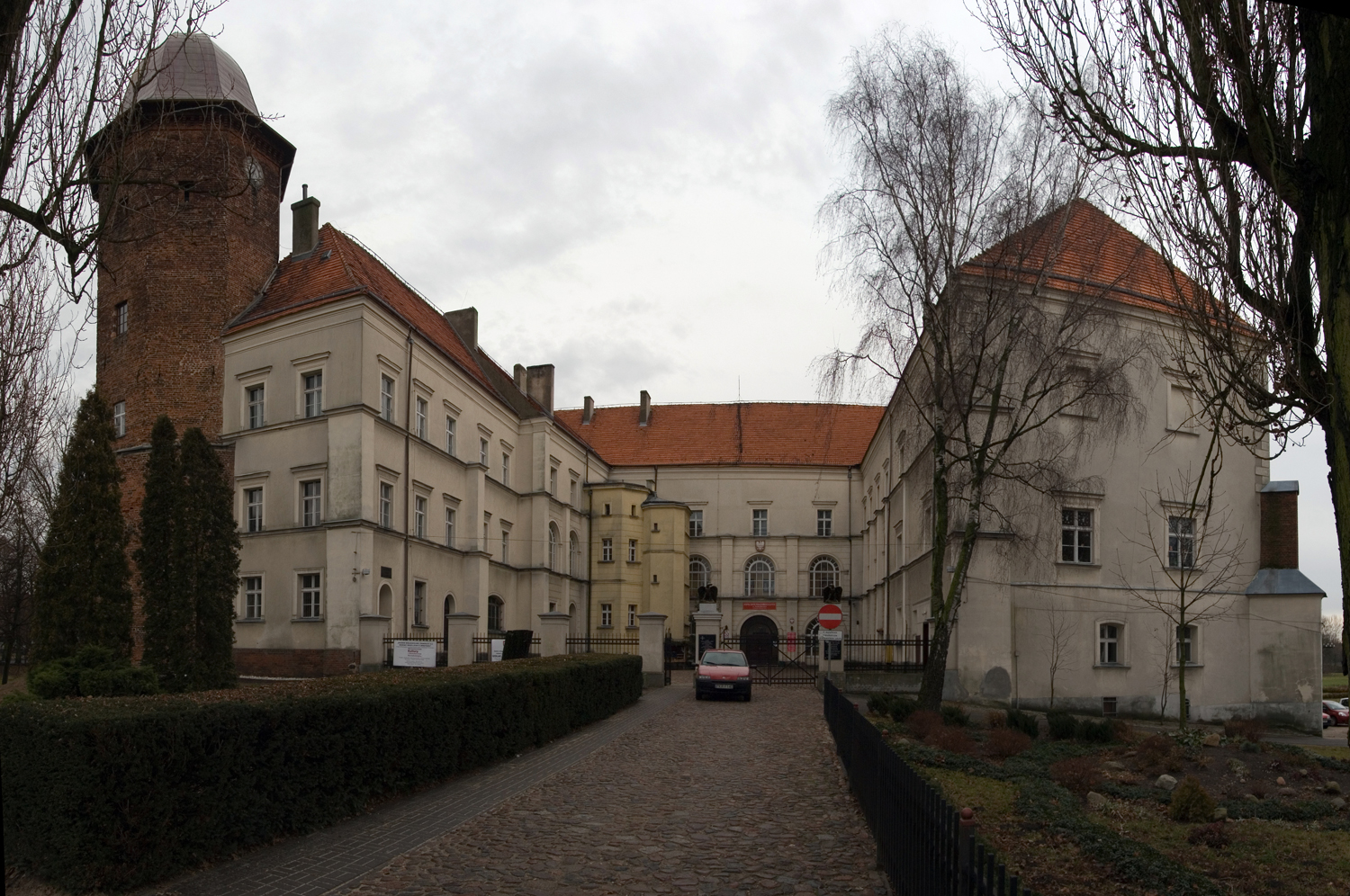 The photo shows Zamek - Muzeum Ziemi Koźmińskiej